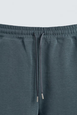 BERMUDA JOGGER RELAXED FIT INTERLOCK / verde lavado - Zara фото 9