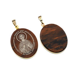 Кулон из обсидиана овал с окантовкой " Св. Анатолий " 20*30мм.
