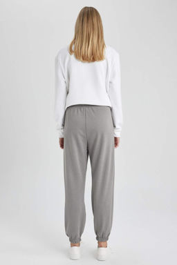 Длинные спортивные штаны из плотной ткани стандартного кроя Jogger с эластичной окантовкой - Defacto фото 5