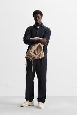 PLEATED JOGGER TROUSERS