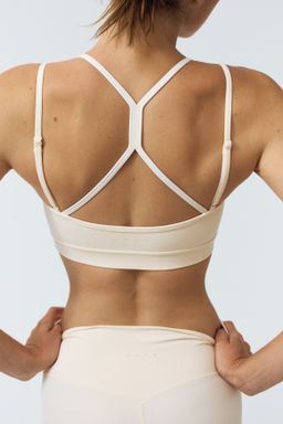 Sujetador de deporte con SoftMove - H&m фото 6