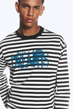 Camiseta boxy de manga larga y estampado gr?fico - H&m фото 6