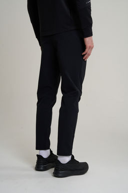 Брюки текстильные Черный ANTA RUNNING Woven Track Pants фото 6