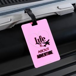 Бирка на чемодан резиновая Life is about adventure, розовая