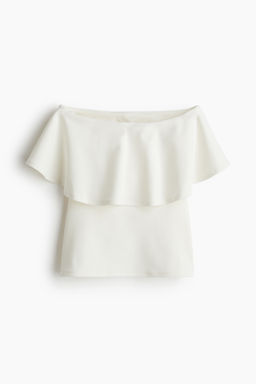 Top interlock con escote bandeau de volante