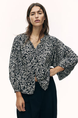 Blusa con mangas globo