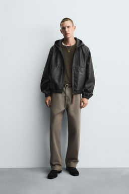 HOODED LEATHER EFFECT JACKET