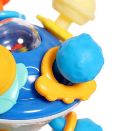 Развивающая игрушка - погремушка с прорезывателем для зубов «Летающая тарелка»