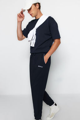 Lacivert Regular Fit Bask?l? Biyeli Lastik Paca Esofman Alt? TMNSS22EA0121