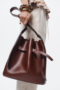 KNOTTED STITCHED BUCKET BAG