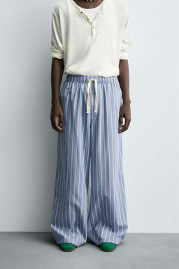 STRIPED OVERSIZE FIT TROUSERS