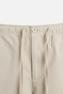 REGULAR FIT JOGGER WAIST TROUSERS - Zara фото 29