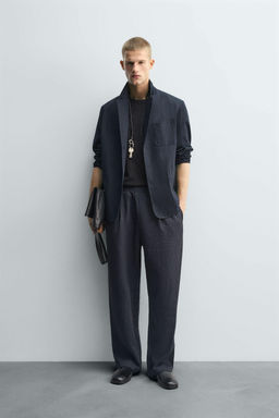 FLOWING PLEATED TROUSERS