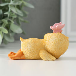 Фигурка полистоун «Спящий утёнок с бабочкой», 8.5×4×5 см