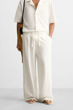 RELAXED FIT TEXTURED TROUSERS - Zara фото 2