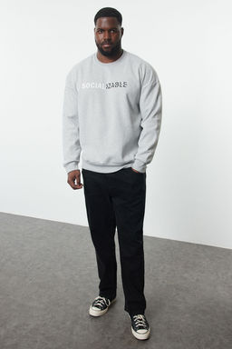TRENDYOL MAN Antrasit MelanjOversize/Genis Kesim Bisiklet Yaka Yaz? Bask?l? Buyuk Beden Sweatshirt TMNAW25AO00019