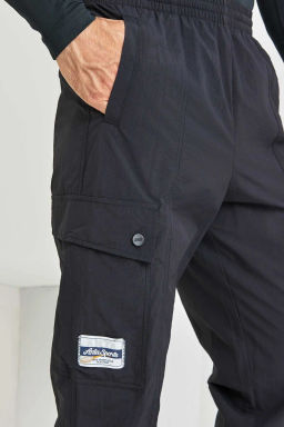 Брюки текстильные Anta FRISBEE ALLIANCE  фото 3