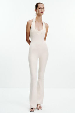 INTERLOCK FLARE JUMPSUIT