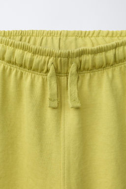 CONJUNTO CAMISETA Y BERMUDA INTERLOCK / Pistacho