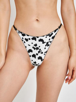 31204122241 Трусы стринг жен Cruella белый принт
