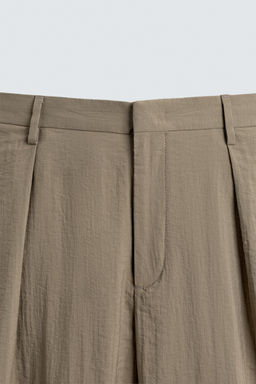 PANTAL?N FLUIDO RELAXED FIT EFECTO ARRUGADO / Beige - Zara фото 9