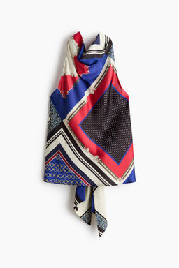 Top halter con escote drapeado