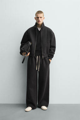PANTAL?N JOGGER T?CNICO PLIEGUES / Negro