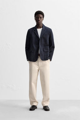 TEXTURED CHINO TROUSERS