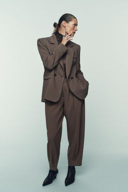 CARROT TROUSERS WITH ZIP