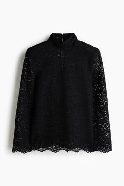 Blusa de encaje con hombreras