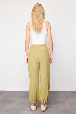 TRENDYOLMILLA Yag Yesili Jogger Normal Bel Pacas? Lastikli Dokuma Pantolon TWOSS23PL00158  фото 6