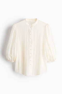Blusa con mangas globo