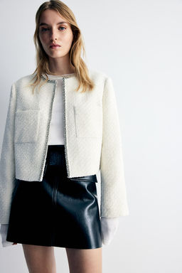 Chaqueta de boucle con strass