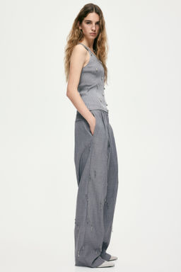 Top sin mangas embellecido con cuentas - H&m фото 3