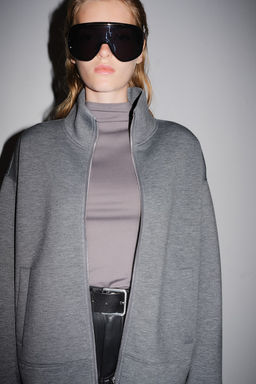 Cardigan efecto neopreno con cremallera