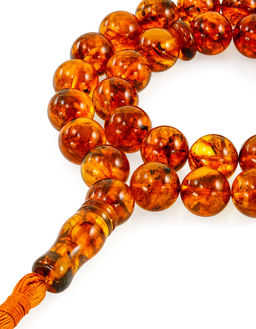 Четки из натурального формованного янтаря Шар крупный коньячный