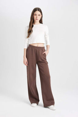 Простые спортивные штаны с широкими штанинами, эластичной талией, шнуровкой, карманами и широкими штанинами - Defacto фото 2