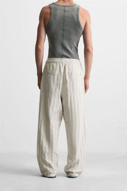 RELAXED FIT JACQUARD TROUSERS - Zara фото 13