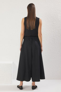 TRENDYOLMILLA Siyah Etek Gorunumlu Paper Touch Wide Leg Extra Genis Paca Beli Lastikli Pantolon TWOSS25PL00101 фото 4