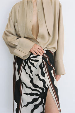 Falda en mezcla de lino con detalle girado