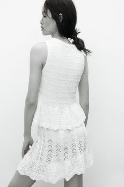 Top en punto pointelle con peplum - H&m фото 5