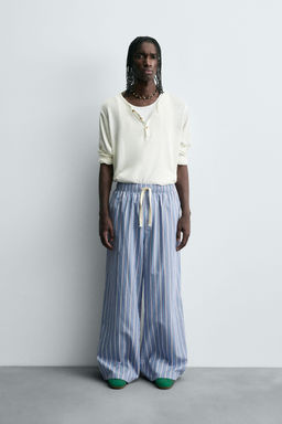 STRIPED OVERSIZE FIT TROUSERS