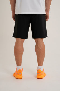 Шорты трикотажные Черный ANTA TRN-ESSENTIAL Knit Half Pants фото 5