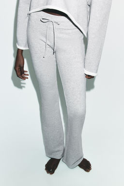 PANTAL?N FLARE EFECTO LAVADO / Gris vigor?