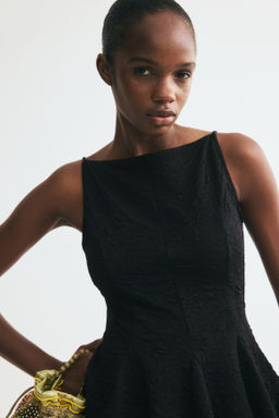 Top texturizado con peplum - H&m фото 5
