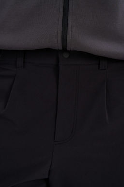 Брюки текстильные Черный ICONIC Woven Track Pants - Anta фото 7