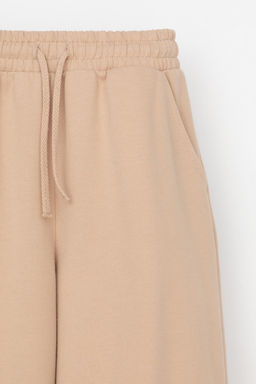 КР 400820/нежный бежевый к567 брюки для дев - Crockid фото 2