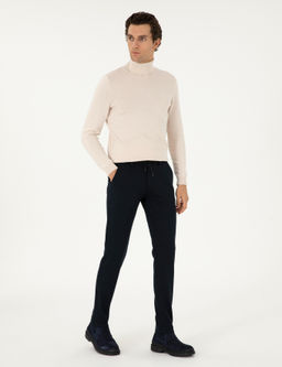 Темно-синие брюки узкого кроя из плотной ткани