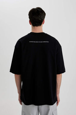 Свободная футболка с коротким рукавом и круглым вырезом сзади с принтом и карманами - Defacto фото 7