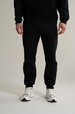 Брюки трикотажные Черный ANTA TRN Knit Track Pants